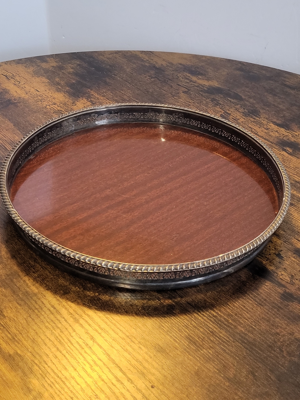 Crescent Formica Laminated Plastic Label on Dark Wood